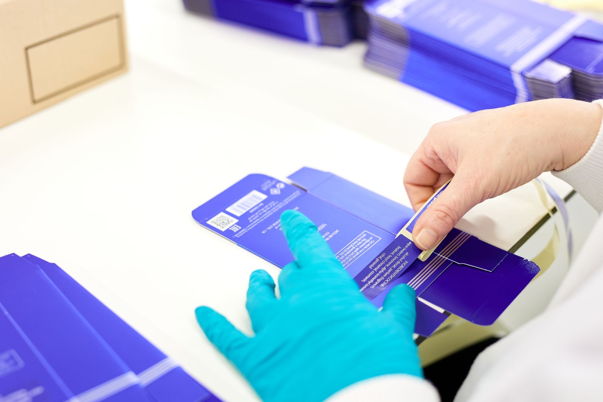 Sticking labels on packaging